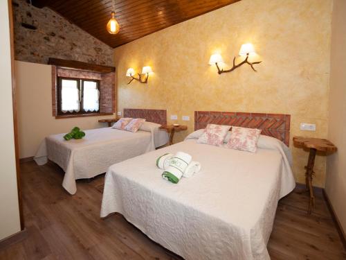 Ένα ή περισσότερα κρεβάτια σε δωμάτιο στο Casa Picu La Pantorra