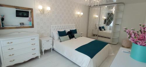 Кровать или кровати в номере VIP Апартаменты