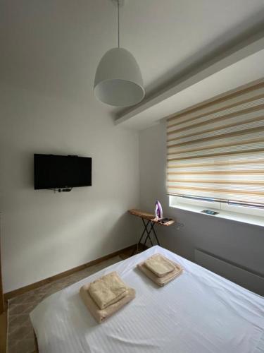 Postel nebo postele na pokoji v ubytování Apartman 13