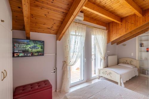 Postel nebo postele na pokoji v ubytování Captain's Gem