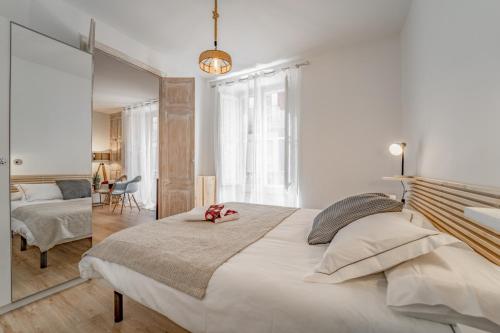 A bed or beds in a room at 3.1 Apartamento Cap del Bosc