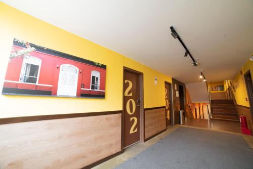 a hallway with a number on the wall at Centro by Casa Andina Miraflores in Lima