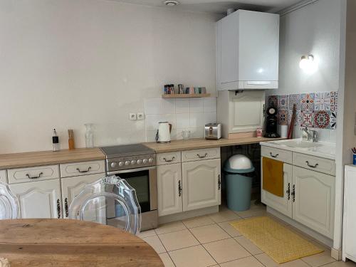 A cozinha ou cozinha compacta de Nantua: joli appartement idéalement situé.