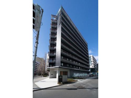 a tall building on the side of a street at R&B Hotel Sendai Higashiguchi - Vacation STAY 39921v in Sendai