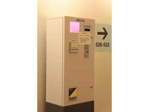 a vending machine in a room with a wall at R&B Hotel Sendai Hirosedori Ekimae - Vacation STAY 39668v in Sendai