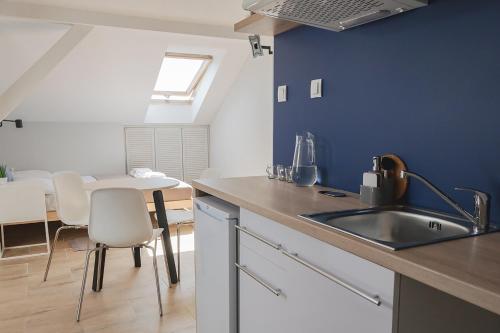 Kuchyň nebo kuchyňský kout v ubytování Apart Hostel S8