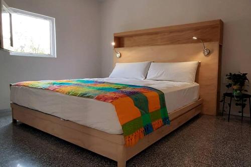 Ένα ή περισσότερα κρεβάτια σε δωμάτιο στο 122 LOFT CONFORT CENTRO HISTÓRICO CDMX