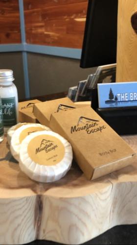 a table with two boxes of food on a table at THE BRANSINN Entertainment District in Branson