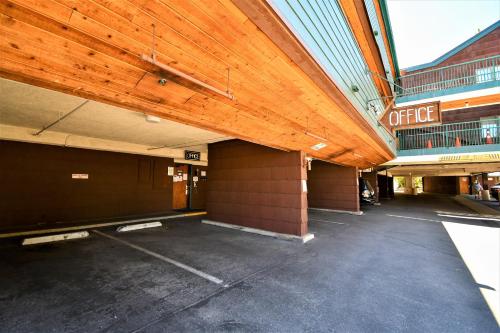 an empty parking lot in front of a building at Snow Lake Lodge in Big Bear Lake
