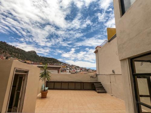 a view of a building with a sky at Posada del Carmen in Zacatecas