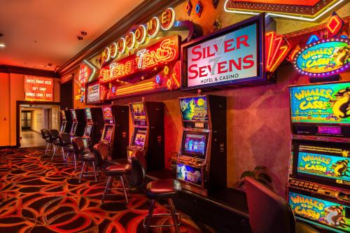 a casino with a bunch of slot machines at Silver Sevens Hotel & Casino in Las Vegas