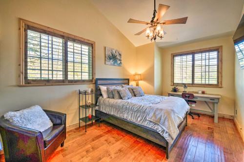 a bedroom with a bed and a desk and a ceiling fan at Lavish Jeremy Ranch Retreat - 6 Mi to the Canyons! in Park City
