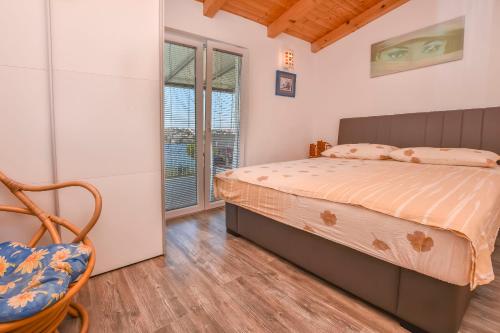 Postel nebo postele na pokoji v ubytování House Osti