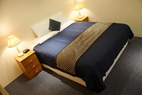 Ένα ή περισσότερα κρεβάτια σε δωμάτιο στο Motel Mount Gambier
