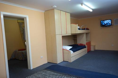 Ένα ή περισσότερα κρεβάτια σε δωμάτιο στο Motel Mount Gambier