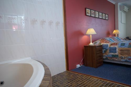 Ένα ή περισσότερα κρεβάτια σε δωμάτιο στο Motel Mount Gambier
