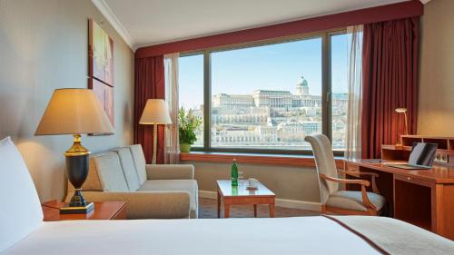 a hotel room with a view of the city at InterContinental Budapest by IHG in Budapest