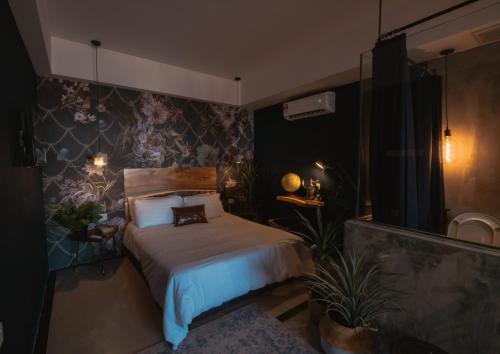 Ein Bett oder Betten in einem Zimmer der Unterkunft Very Hotel