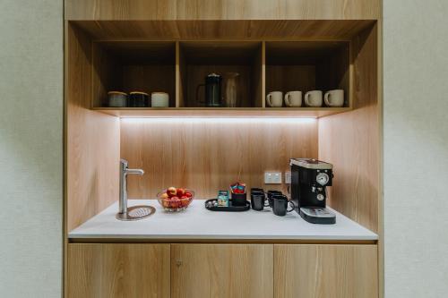 Cuisine ou kitchenette dans l'établissement Aerotel Sydney - Inside International Terminal Airport