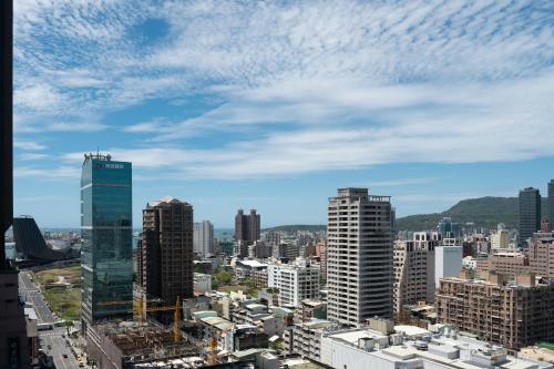 a view of a city with tall buildings at LJ Hotel in Kaohsiung