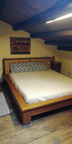 A bed or beds in a room at CASA ALESSIA MONOLOCALE