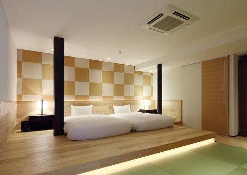 En eller flere senge i et værelse på Kyojuku Usagi - Vacation STAY 46050v