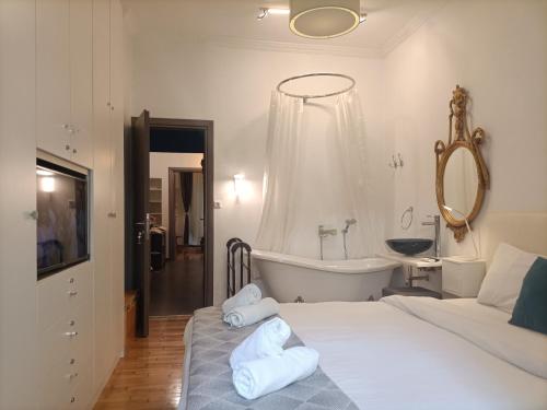 Posteľ alebo postele v izbe v ubytovaní Elegant Apartment