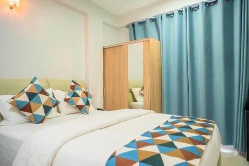 Letto o letti in una camera di Tour Inn