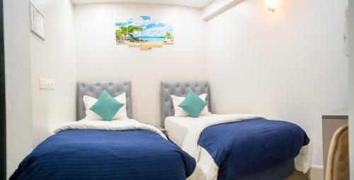 Letto o letti in una camera di Tour Inn