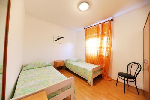 Ένα ή περισσότερα κρεβάτια σε δωμάτιο στο Modern apartment in Zadar, sea view