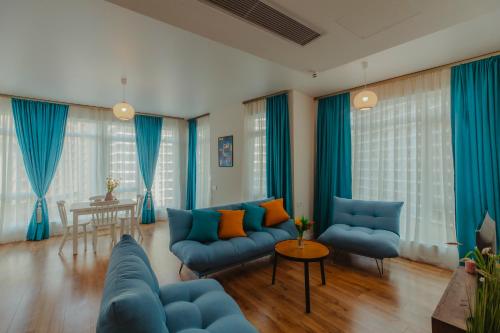 Posezení v ubytování White Sails Residential Hotel