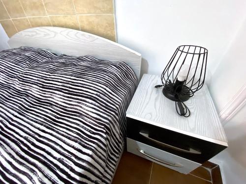 Postel nebo postele na pokoji v ubytování Zebra Apartments Hurghada center