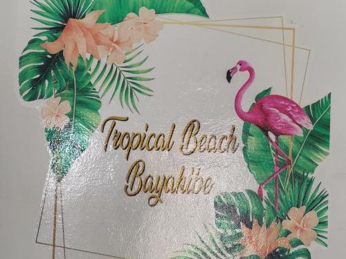 a picture of a flamingo on a tropical beach barbie at Tropical Beach Bayahibe in Bayahibe