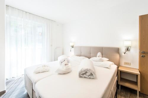 Cama o camas de una habitación en Apartments Graf Hartwig