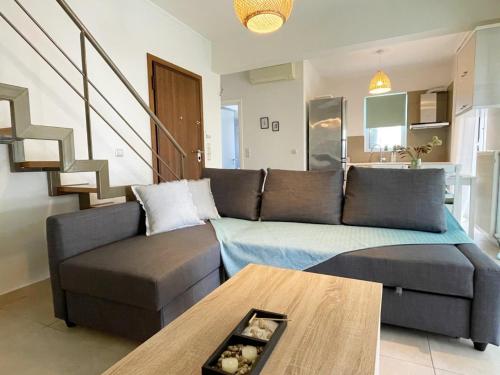 Posezení v ubytování Panos Comfy Apartment