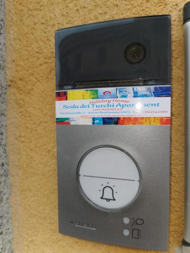 a safe with a stack of books on it at Scala dei Turchi Apartment in Realmonte