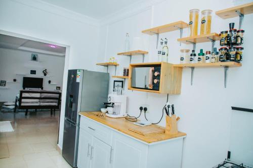 Η κουζίνα ή μικρή κουζίνα στο Winnie's Cozy Home