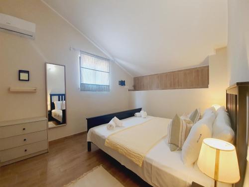 מיטה או מיטות בחדר ב-Villa Regina - Sperlonga Vertice Rooms