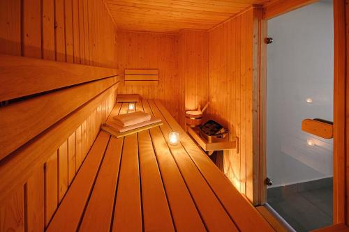 an inside view of a sauna with wooden walls and floors at Chalupa Křenov 62 in Bernartice