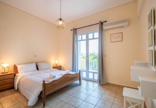 En eller flere senge i et værelse på Andelica Holiday Villa by "elite"