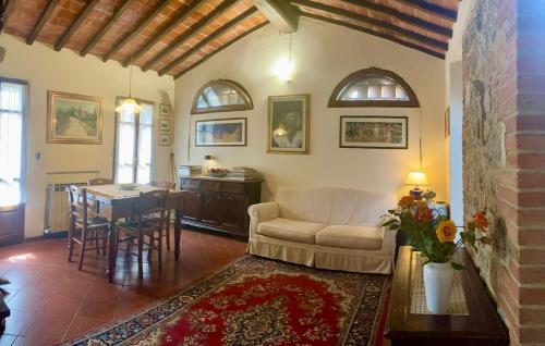 a living room with a couch and a table at Monteriggioni Castello in Monteriggioni