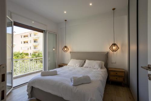 Un ou plusieurs lits dans un hébergement de l'établissement Athens Riviera