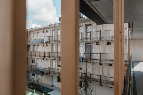 a view of an apartment building from a window at CLOUD N°7 STUDIOS in Tübingen