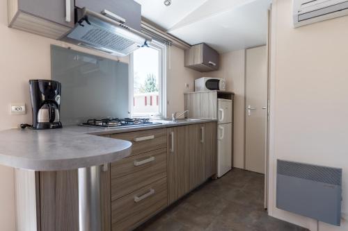 Dapur atau dapur kecil di Camping Nature L'Airial