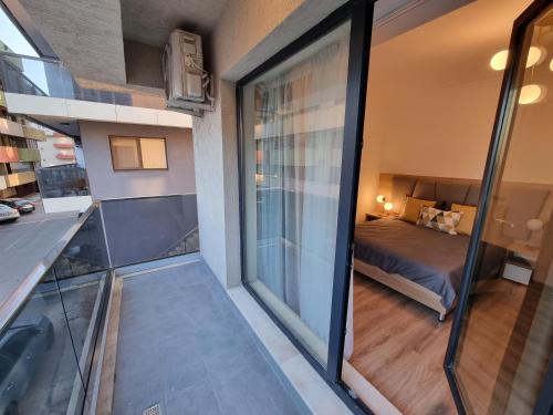 Postel nebo postele na pokoji v ubytování Breeze Studio