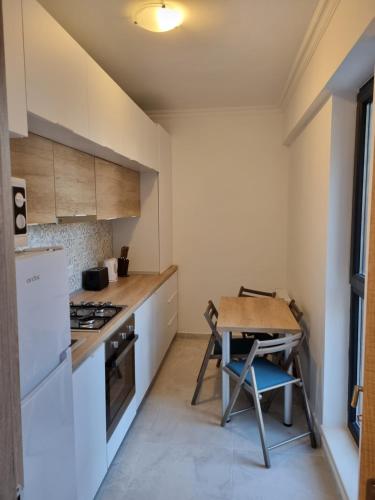 Kuchyň nebo kuchyňský kout v ubytování Breeze Studio