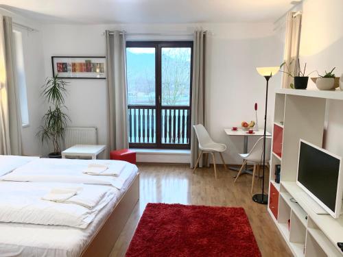Postel nebo postele na pokoji v ubytování Aparthotel Faust