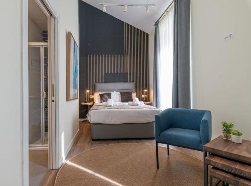Posteľ alebo postele v izbe v ubytovaní Home Art Apartments Málaga