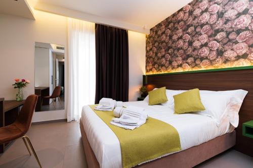 Llit o llits en una habitació de Dimora delle Rose Agriresort