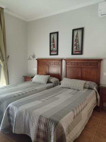 Katil atau katil-katil dalam bilik di Hostal Costa Luz